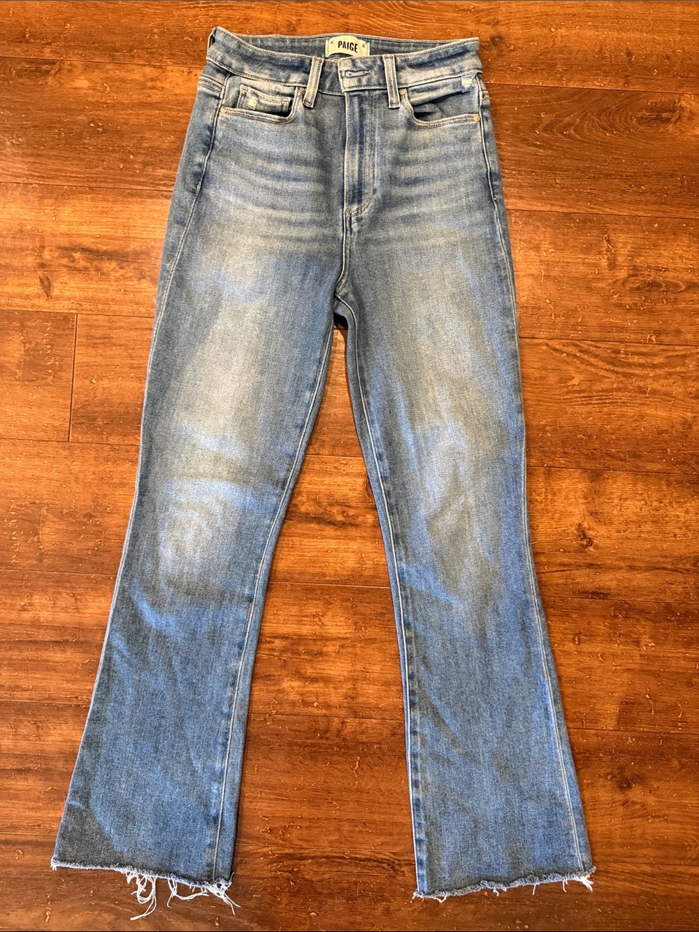 PAIGE Light Blue High-Rise Flare Jeans with Raw Hem